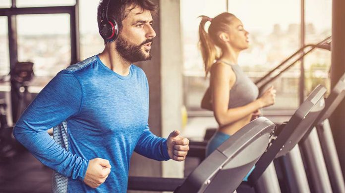 Music,And,Exercises,Go,Together.,Couple,Working,Exercise,On,Treadmill. 6 Workout Myths Debunked