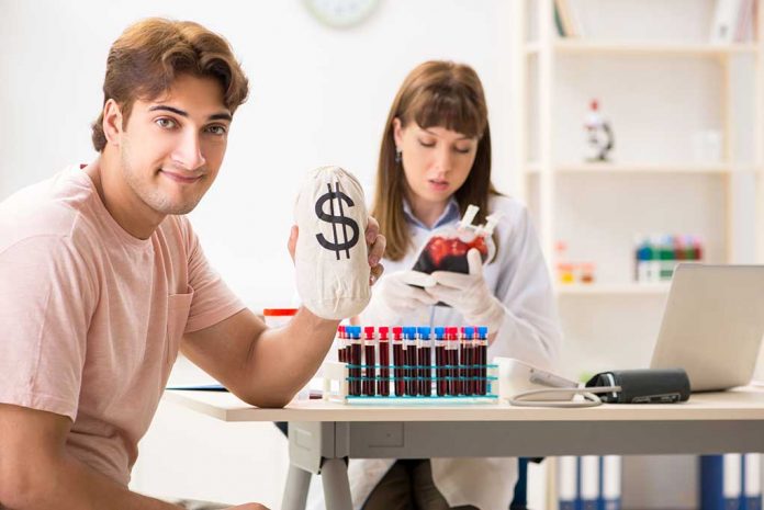 Man,Giving,His,Blood,As,A,Donor 5 Ways to Get Paid for Your Bodily Fluid