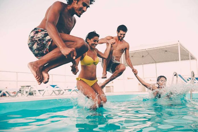 Enjoying,Pool,Party,With,Friends.,Group,Of,Beautiful,Young,People 7 Summer Swimming Dangers (It Could Save a Life!)