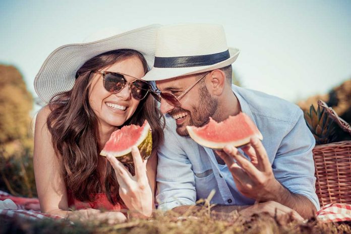 Happy,Young,Couple,Enjoying,Picnic,In,A,Park. 5 Surprising Health Benefits of Eating Watermelon