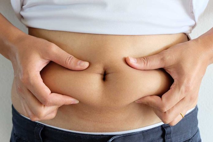 shutterstock_510854272 Could your Beer or Baby Belly Be Caused By This Health Condition?